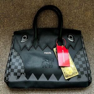 SPRAYGROUND limited edition handbag black tags on never used.